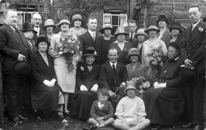 Wedding of Stella Stanley and Ernest Bagshaw with family members.